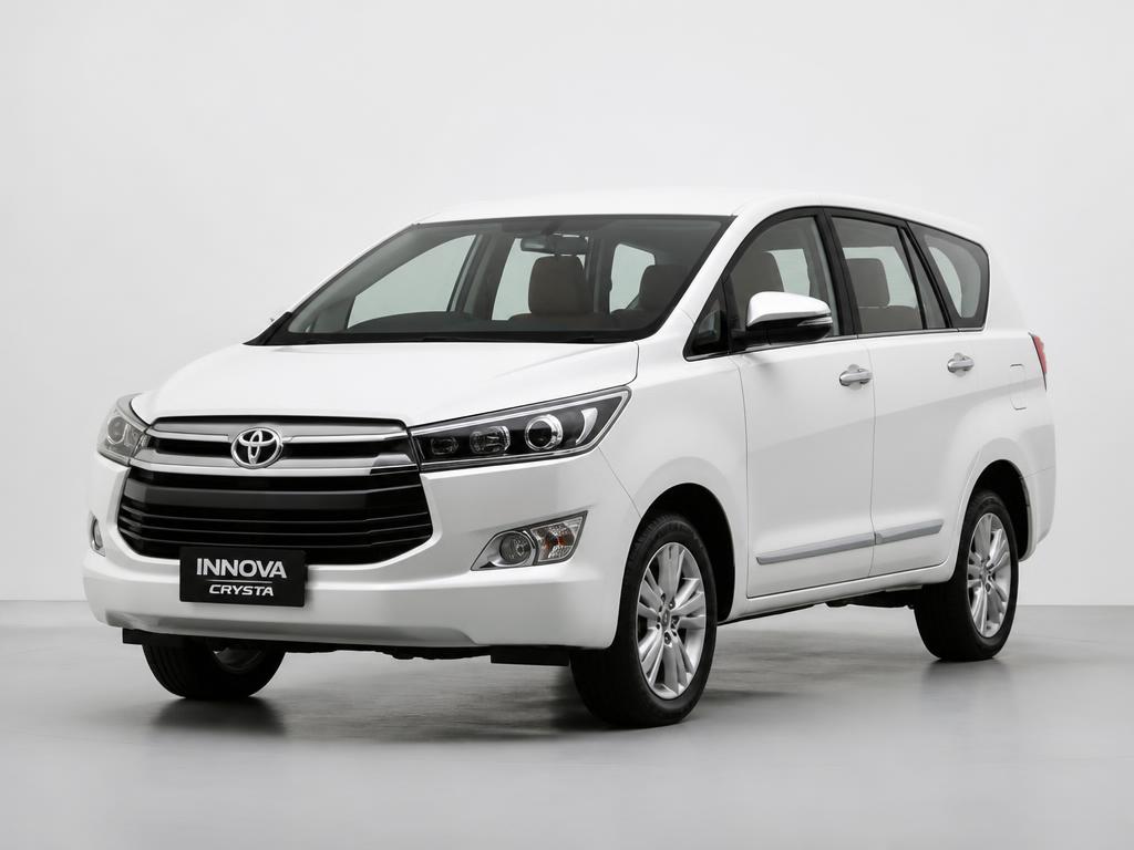 White Toyota Innova Crysta premium SUV on rent from Mahak Travels