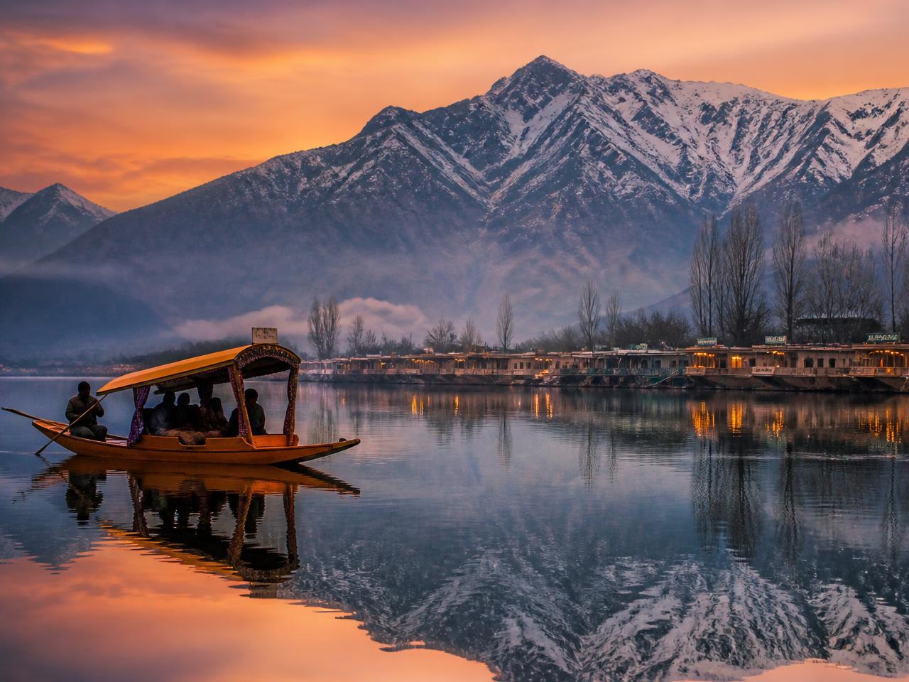Dal Lake and snow mountains in Kashmir valley