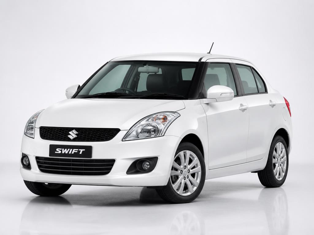 White Maruti Suzuki Swift sedan car on rent from Mahak Travels